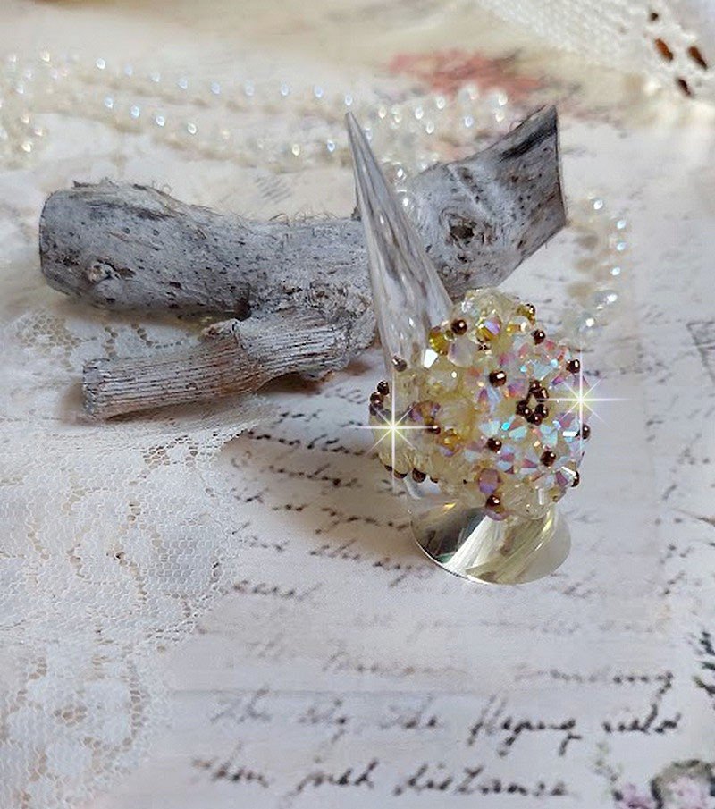 Aurora ring met facetten en draaiende toppen in Swarovski kristal