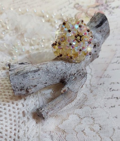 Aurora ring met facetten en draaiende toppen in Swarovski kristal