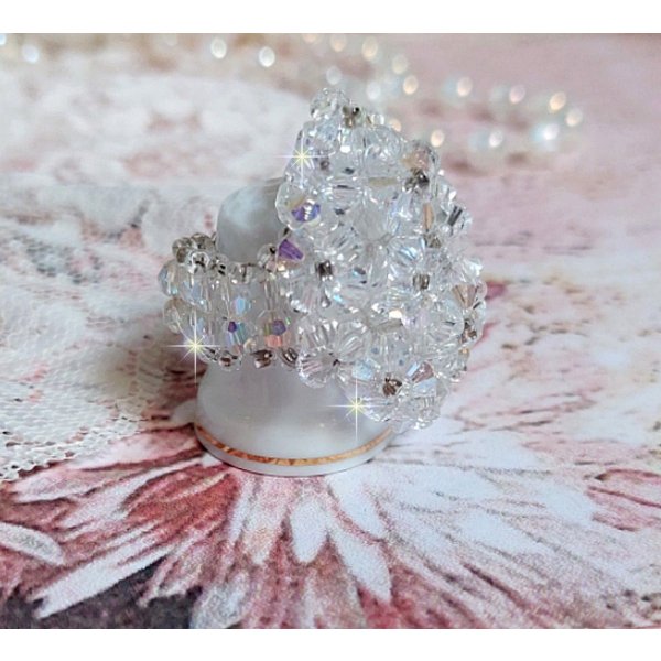 Flock ring met facetten en draaiende toppen in Swarovski kristal