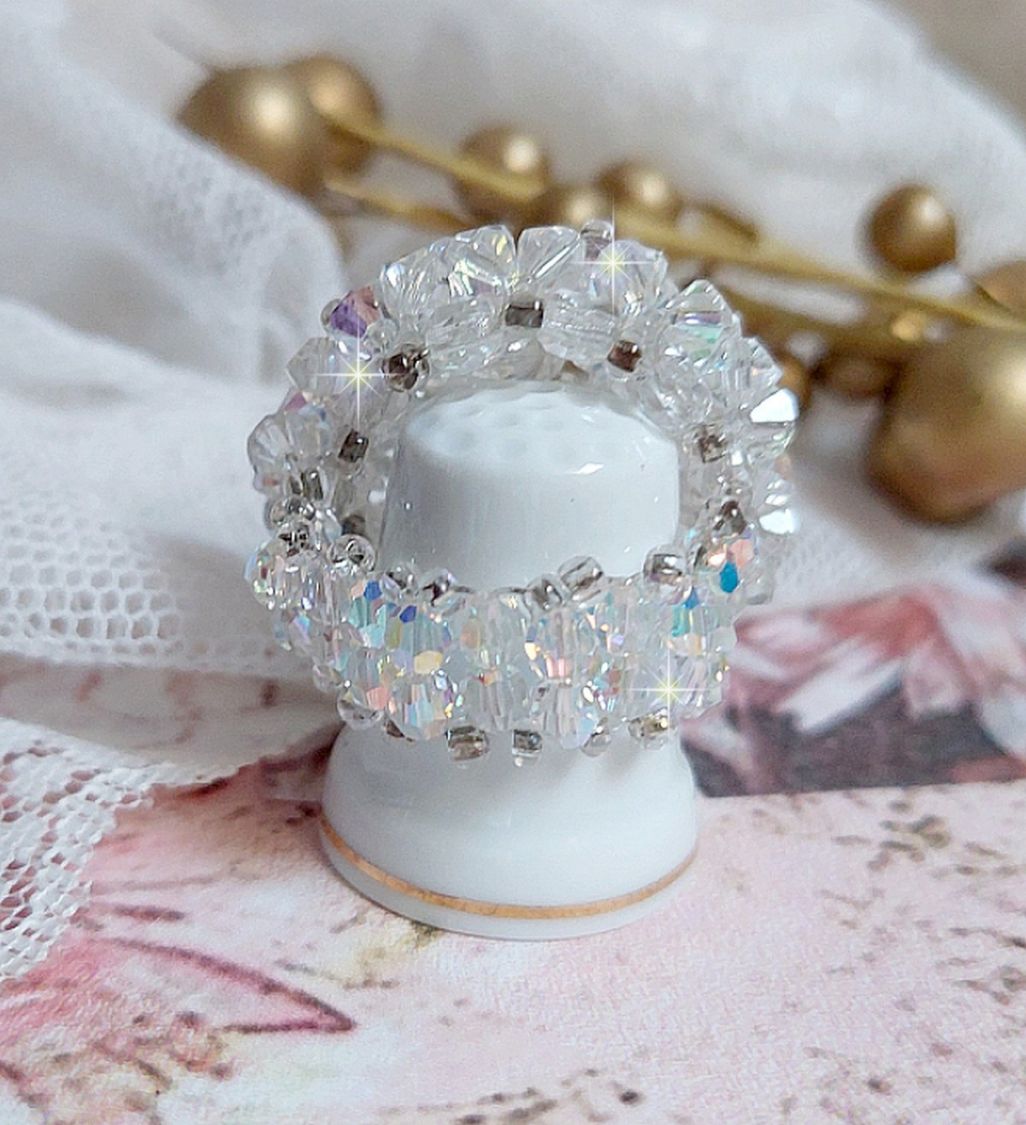 Flock ring met facetten en draaiende toppen in Swarovski kristal