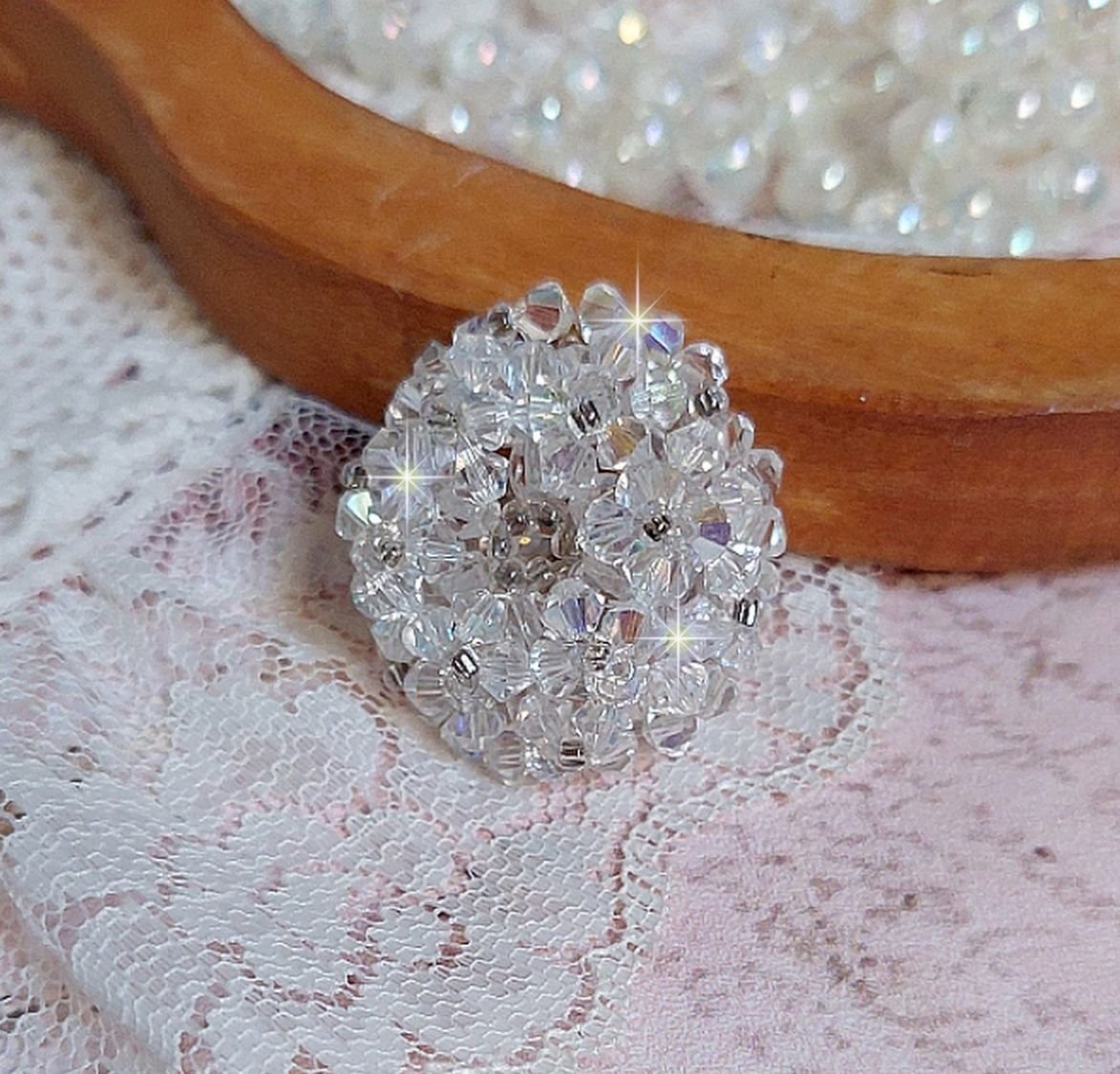 Flock ring met facetten en draaiende toppen in Swarovski kristal