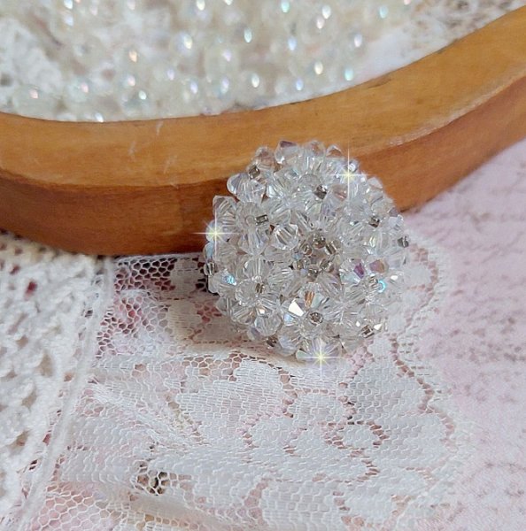 Flock ring met facetten en draaiende toppen in Swarovski kristal