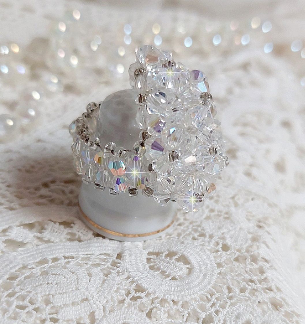 Flock ring met facetten en draaiende toppen in Swarovski kristal