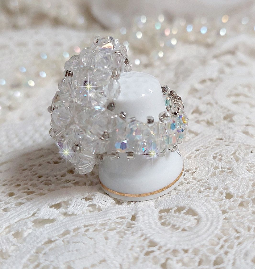 Flock ring met facetten en draaiende toppen in Swarovski kristal