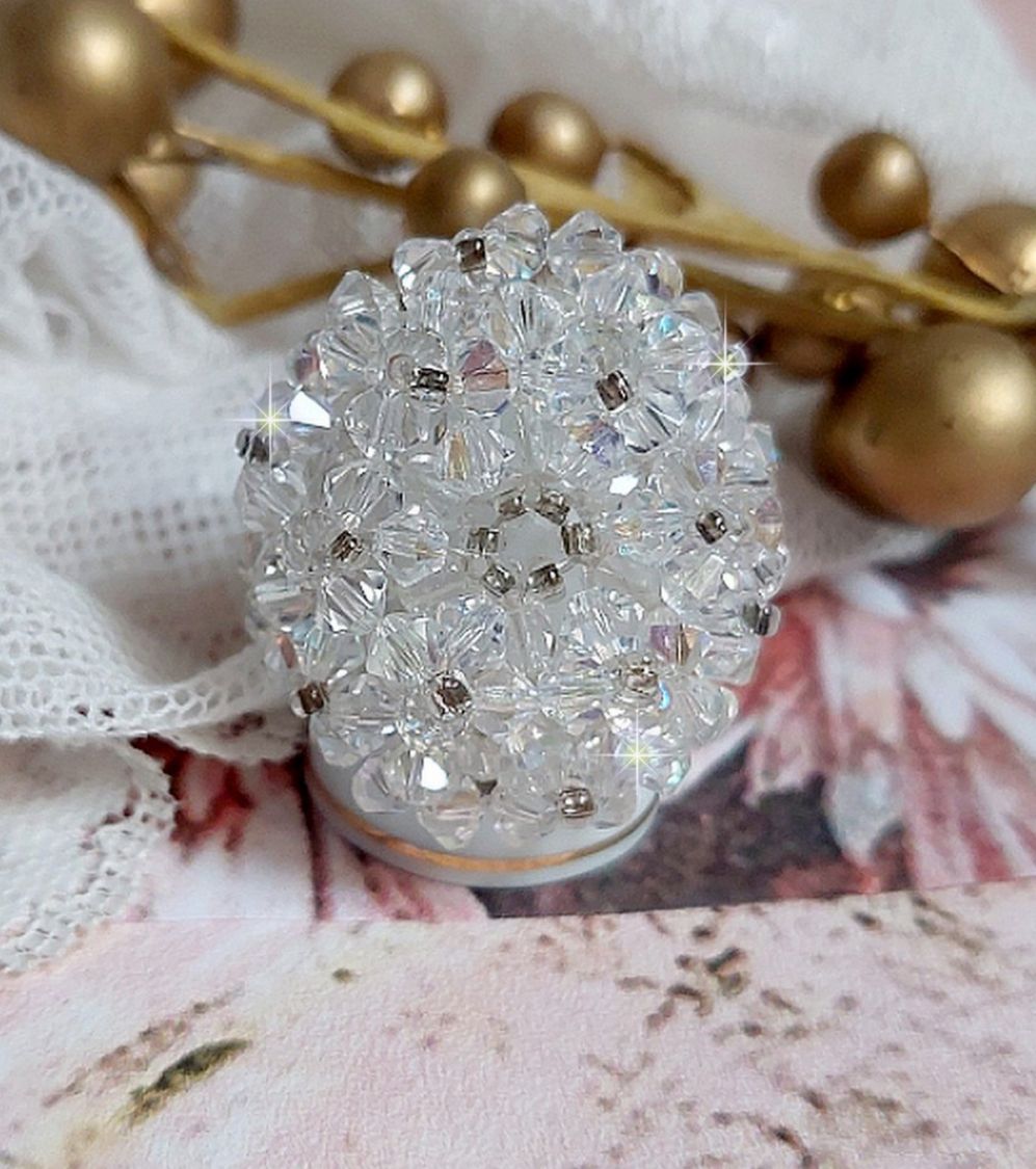 Flock ring met facetten en draaiende toppen in Swarovski kristal