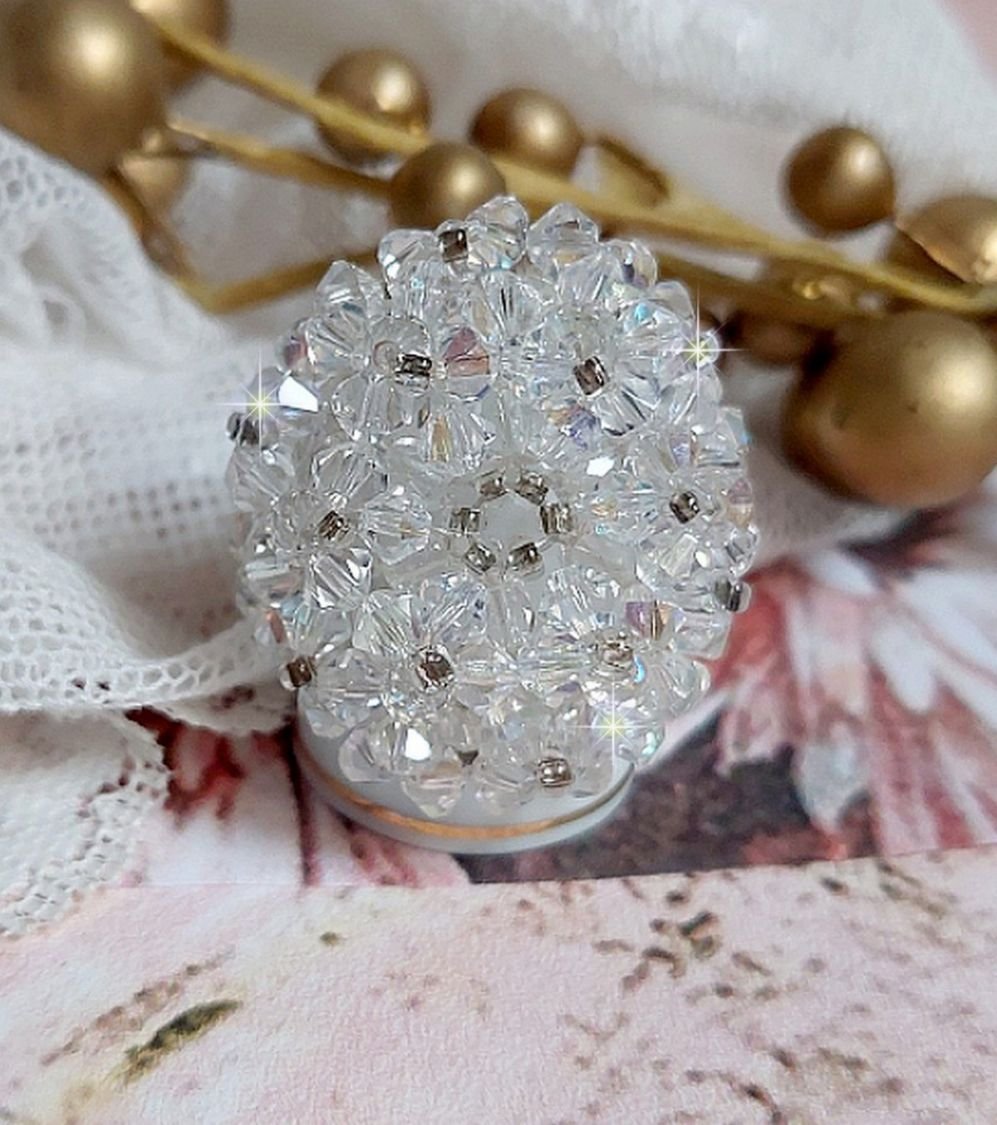 Flock ring met facetten en draaiende toppen in Swarovski kristal
