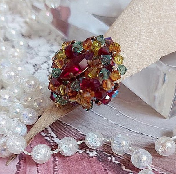 Iroise ring met facetten, draaiende toppen en een Swarovski kristallen shuttle