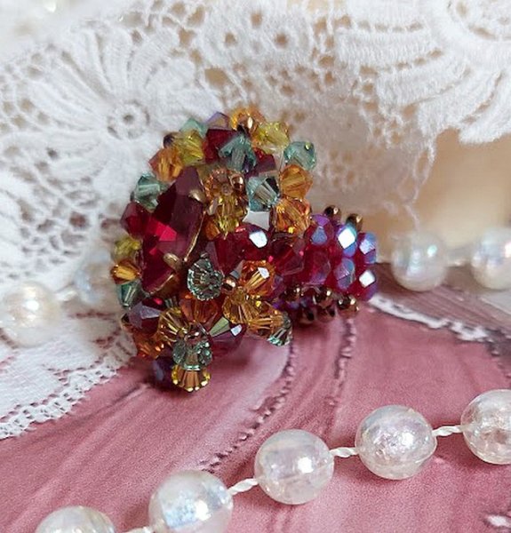 Iroise ring met facetten, draaiende toppen en een Swarovski kristallen shuttle