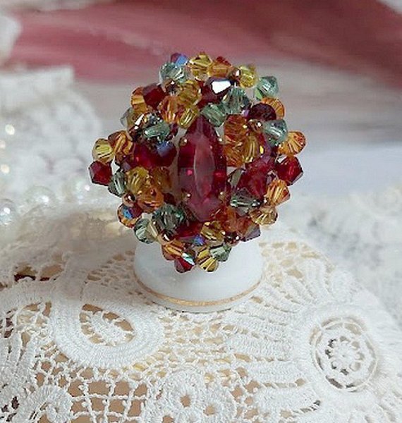 Iroise ring met facetten, draaiende toppen en een Swarovski kristallen shuttle