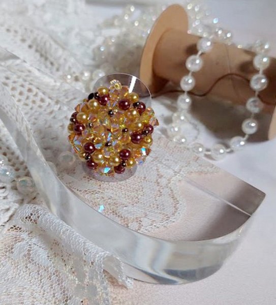Sunshine ring met facetten, parelkraaltjes en Swarovski kristallen spinners