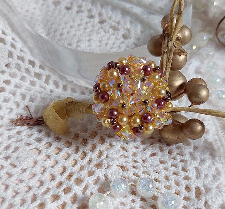 Sunshine ring met facetten, parelkraaltjes en Swarovski kristallen spinners