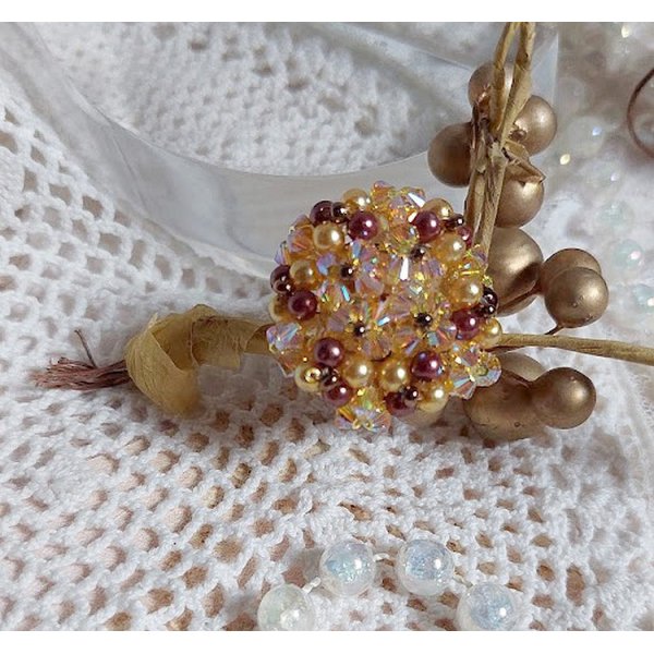 Sunshine ring met facetten, parelkraaltjes en Swarovski kristallen spinners