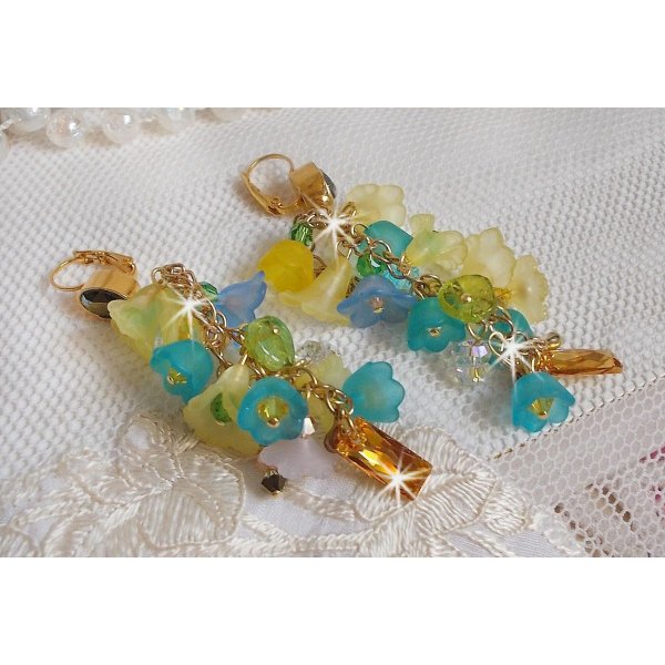 BO Bella Geel gemonteerd met Swarovski kristallen, matte bloemen en parels 