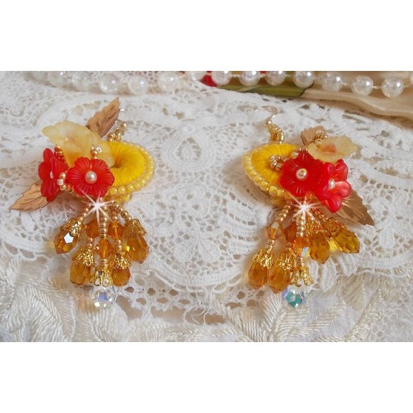 Boterbloem BO geborduurd met Swarovski kristallen en geel/oranje DMC katoen