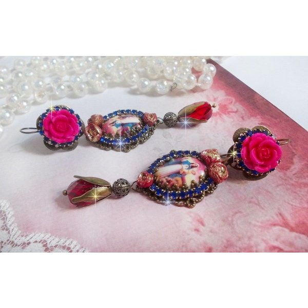 BO Maria en Jezus gemaakt met hars cabochons, rode facetperen en diverse accessoires