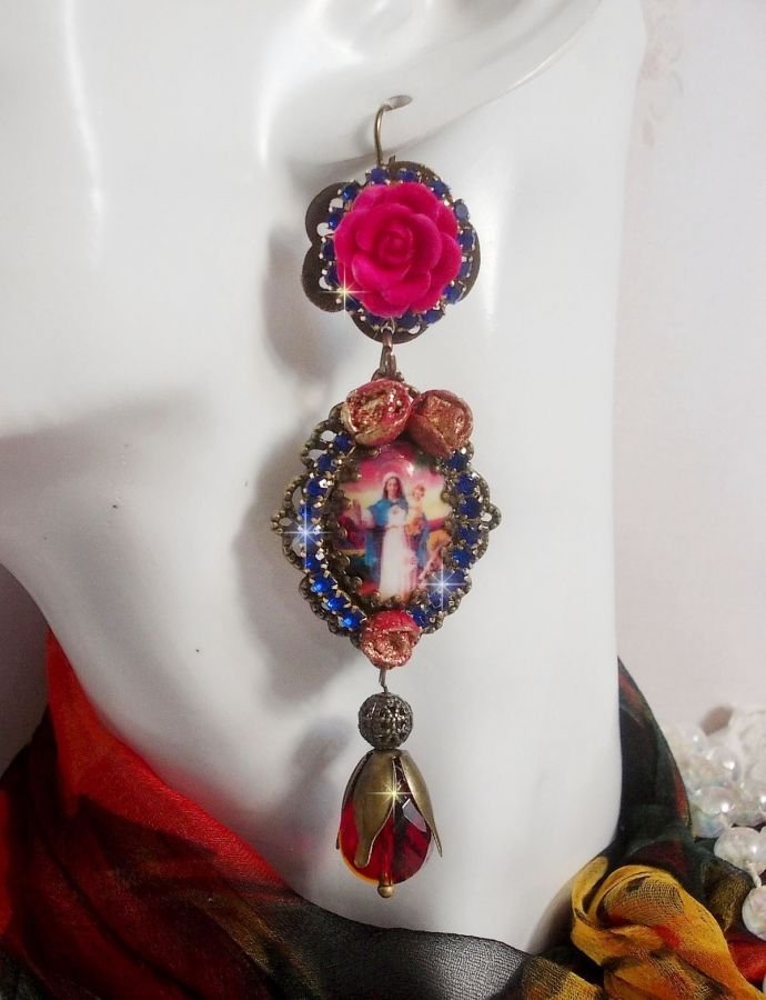 BO Maria en Jezus gemaakt met hars cabochons, rode facetperen en diverse accessoires