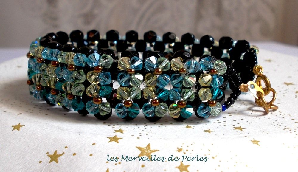 Fonkelende Aurora armband met zwarte facetten en gekleurde tollen in Swarovski kristal