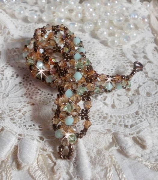 Waterlelie armband, een groen en gouden reflectie met Swarovski kristallen tollen en bohemian glas facetten