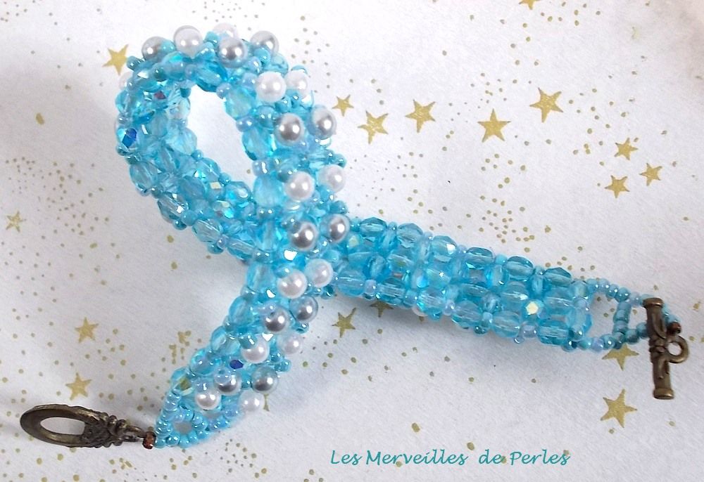 Hemelse kralen armband met facetten en parelmoer glazen kralen