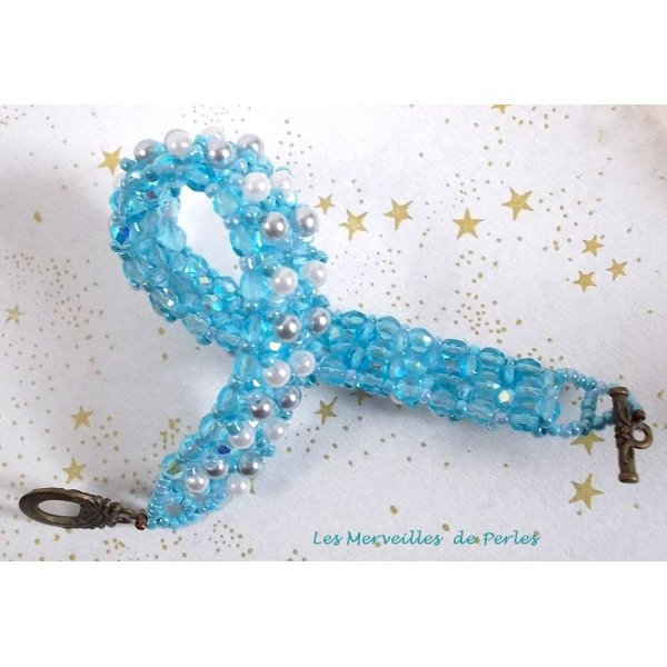 Hemelse kralen armband met facetten en parelmoer glazen kralen