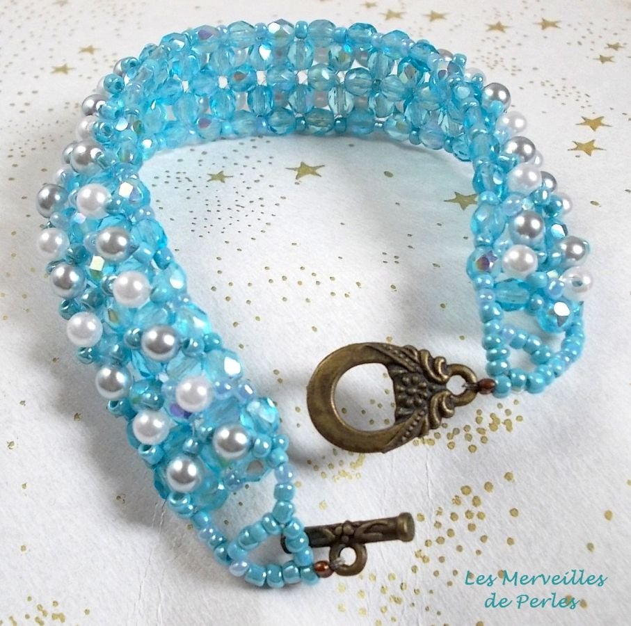 Hemelse kralen armband met facetten en parelmoer glazen kralen