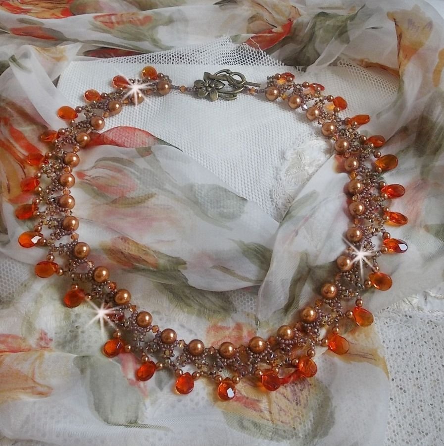 Amber halsketting met Swarovski kristallen parels en facetgeslepen glasdruppels