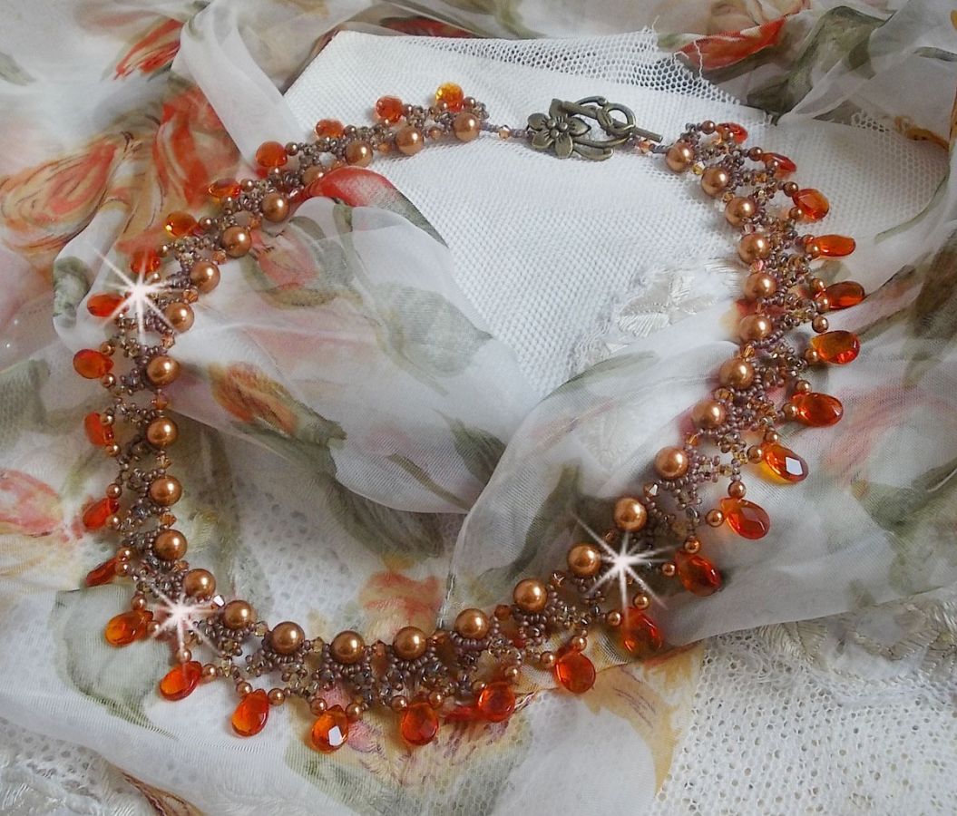 Amber halsketting met Swarovski kristallen parels en facetgeslepen glasdruppels