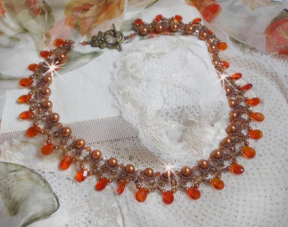 Amber halsketting met Swarovski kristallen parels en facetgeslepen glasdruppels