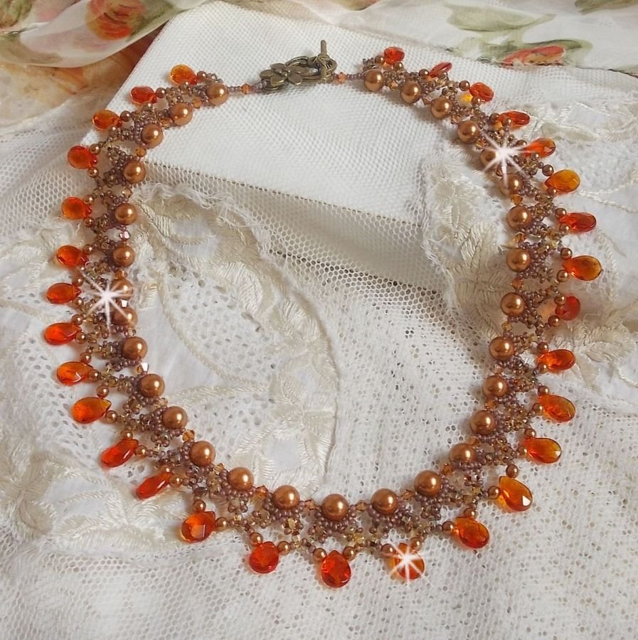 Amber halsketting met Swarovski kristallen parels en facetgeslepen glasdruppels