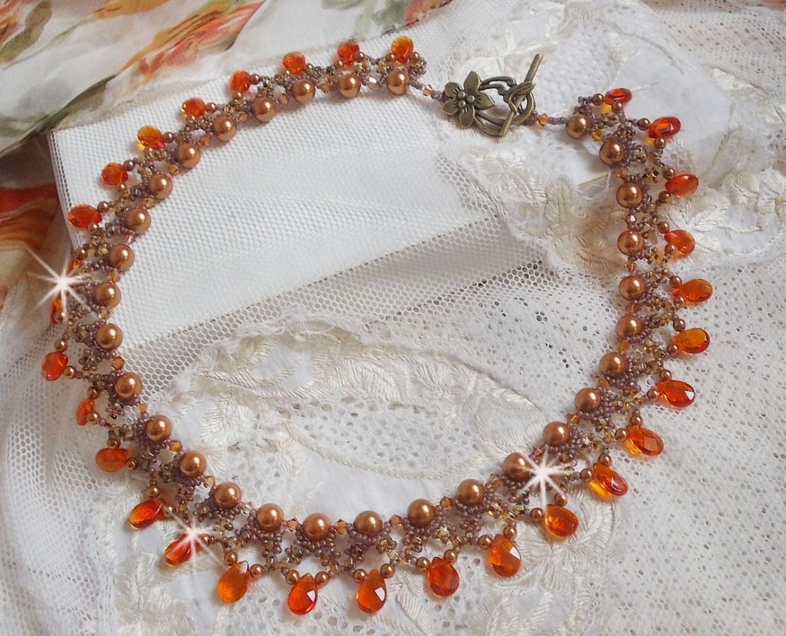 Amber halsketting met Swarovski kristallen parels en facetgeslepen glasdruppels