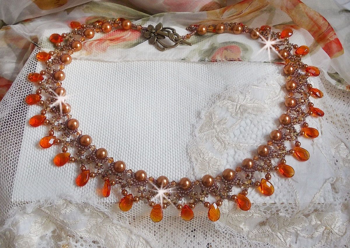 Amber halsketting met Swarovski kristallen parels en facetgeslepen glasdruppels