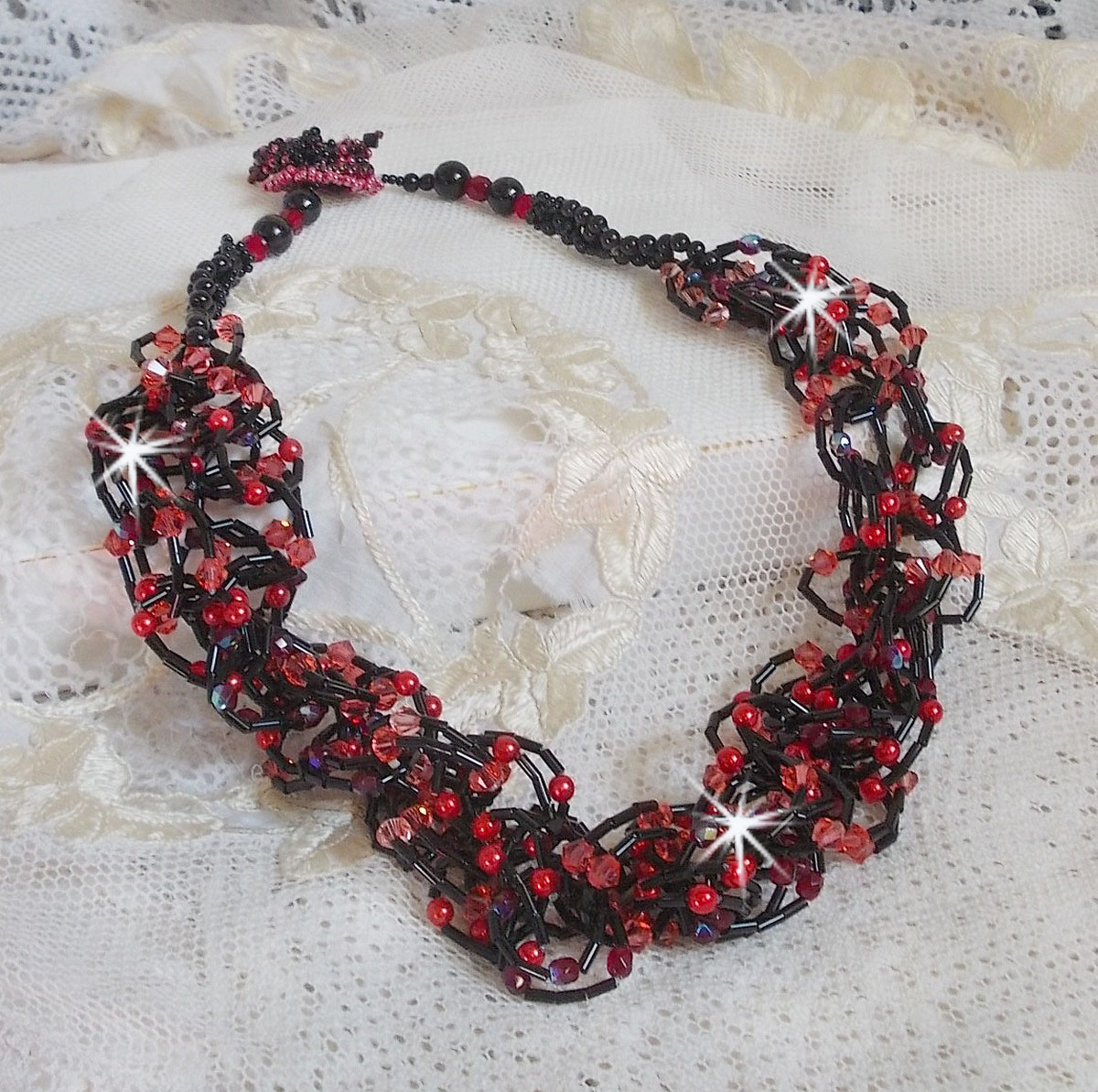 Voel ketting met buiskralen, Swarovski kristallen en facetten