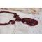 Rubby One ketting geborduurd met Swarovski kristallen en een keramische cabochon