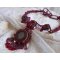 Rubby One ketting geborduurd met Swarovski kristallen en een keramische cabochon