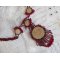 Rubby One ketting geborduurd met Swarovski kristallen en een keramische cabochon