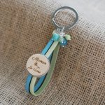 Dubbele lederen sleutelhanger met gepersonaliseerde houten kap