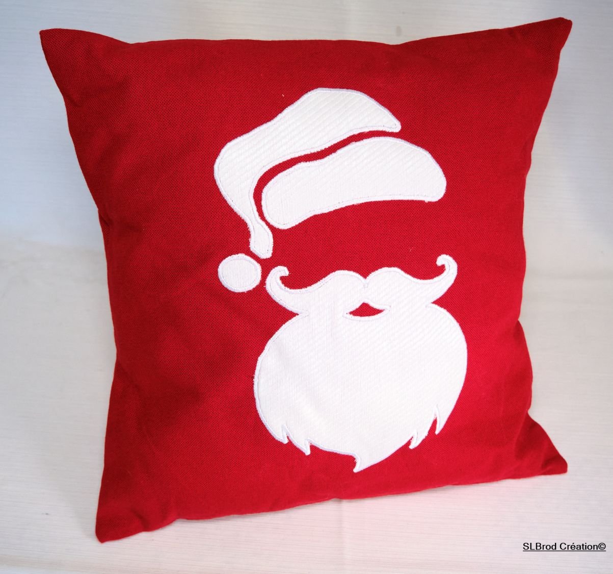 Kussenhoes kerstman hoofd in appliqué