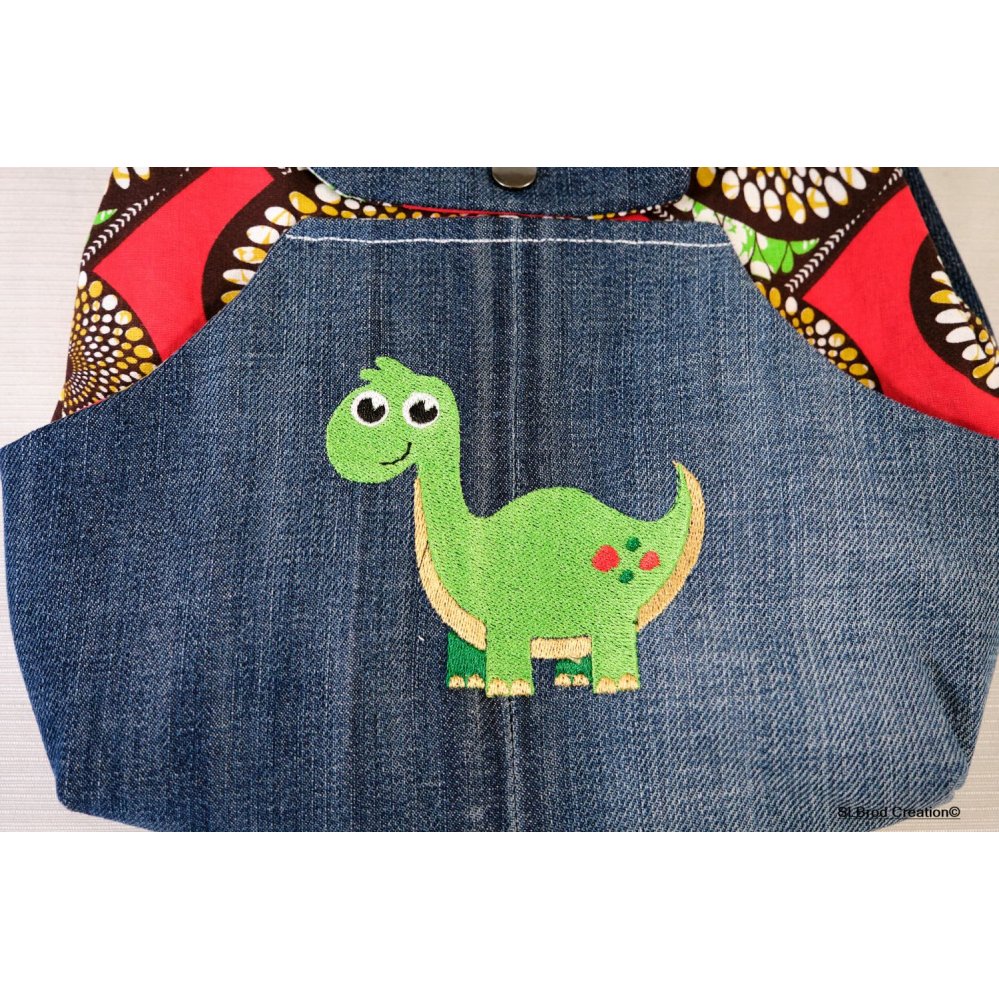 Kinderrugzak geborduurd met dinosaurus en was te personaliseren met uw naam