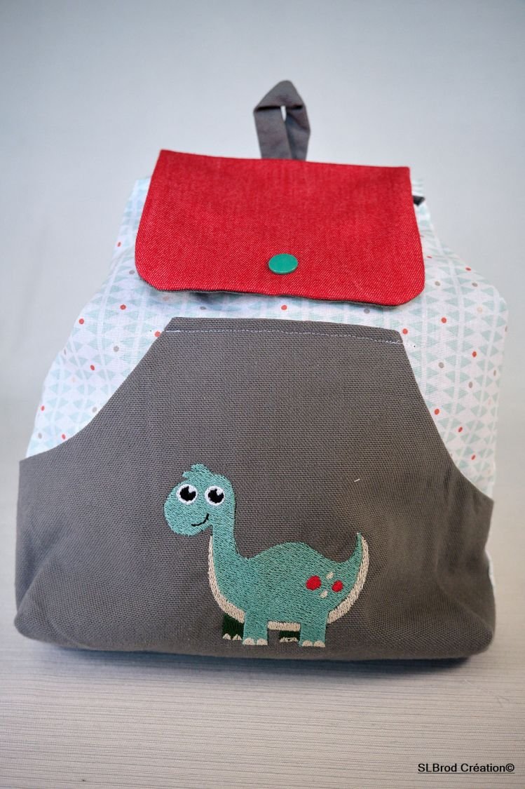 Geborduurde dinosaurus rugzak om te personaliseren